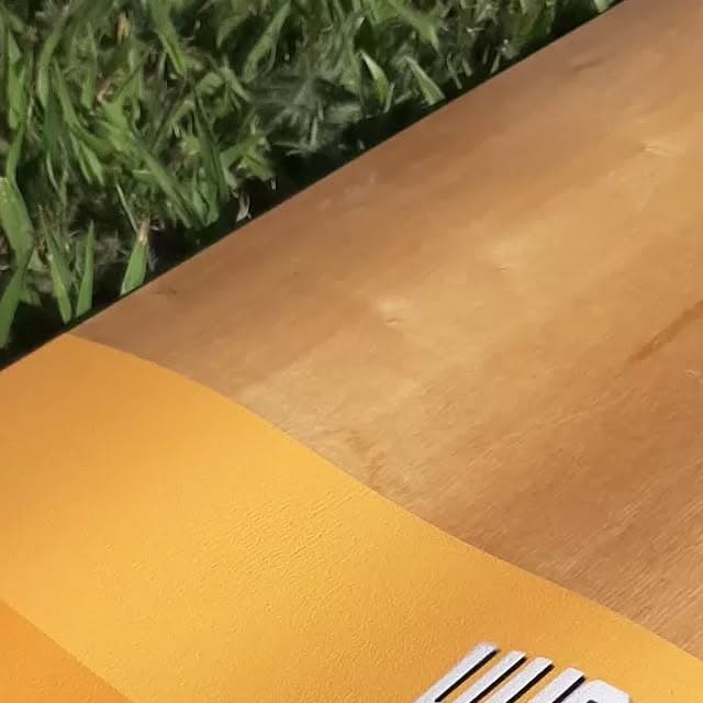 Deck on grass — yellow and orange